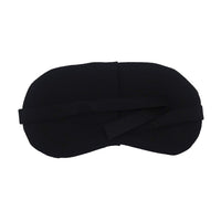 Side view of a sleep mask for travel, showing the adjustable elastic strap for a secure fit.