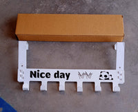 Full view of white heavy-duty over door hook hanger rack with 6 hooks