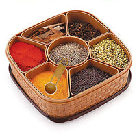 Plastic Masala Dabba with seven compartments, showcasing traditional rangoli design.