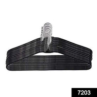 Close-up view of the smooth, durable stainless steel hangers, highlighting their quality construction.
