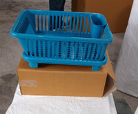 Detailed view of the plastic dish rack design, perfect for efficient kitchen drying.