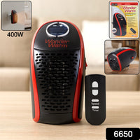 400W wall plug heater plugged into wall socket warming a room