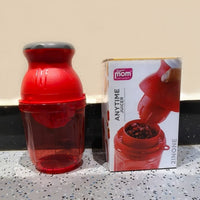 Manual juicer in use squeezing fresh fruit juice easily