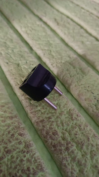 Compact handheld 2 Pin Plug Adapter, ideal for travel in India