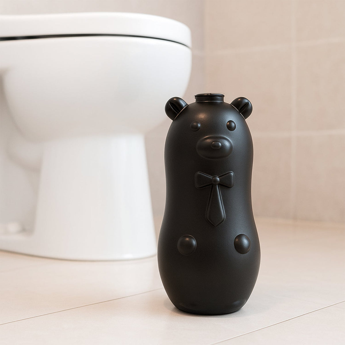 Decorative bear shaped toilet tank cleaner with neck tie detail