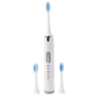 Rechargeable electric toothbrush handle with soft bristle brush head attached