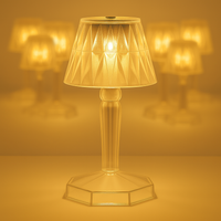 The crystal table lamp showcasing its unique reflection light effect in a dark room.