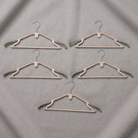 Sturdy plastic clothes hangers for daily wardrobe use