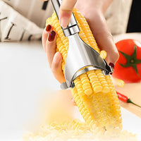 Close-up of serrated blade on stainless steel fruit and vegetable peeler