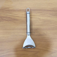 Vegetable skin remover tool with ergonomic handle and sharp blade
