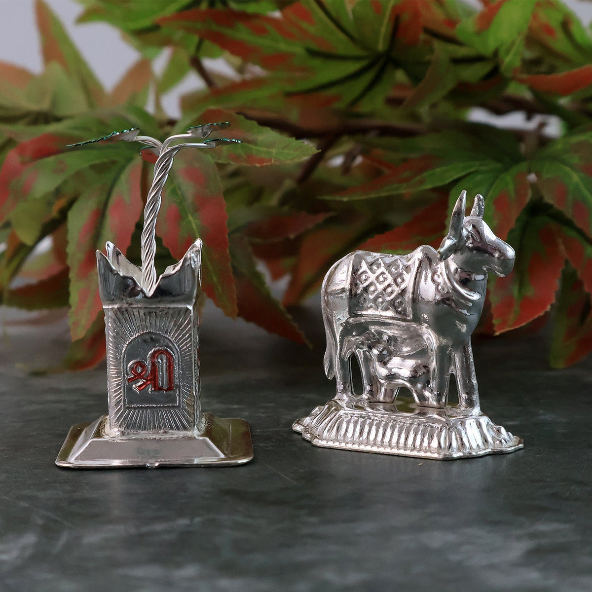 Elegant silver-plated Kamdhenu cow and Tulsi plant pair for religious blessings