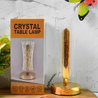 Side view of crystal table lamp glowing warmly with USB powered LED