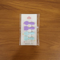 Playful hair styling using decorative spoon and spatula hair clips