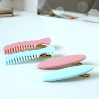 Display of elegant pastel comb-style hair clips for everyday wear