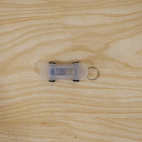 Mini skateboard LED keychain in use