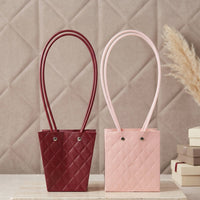 Bag used for bouquet packaging in floral shop setting