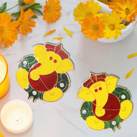 Festive Lord Ganesha wall hanging stickers displayed in a pooja room