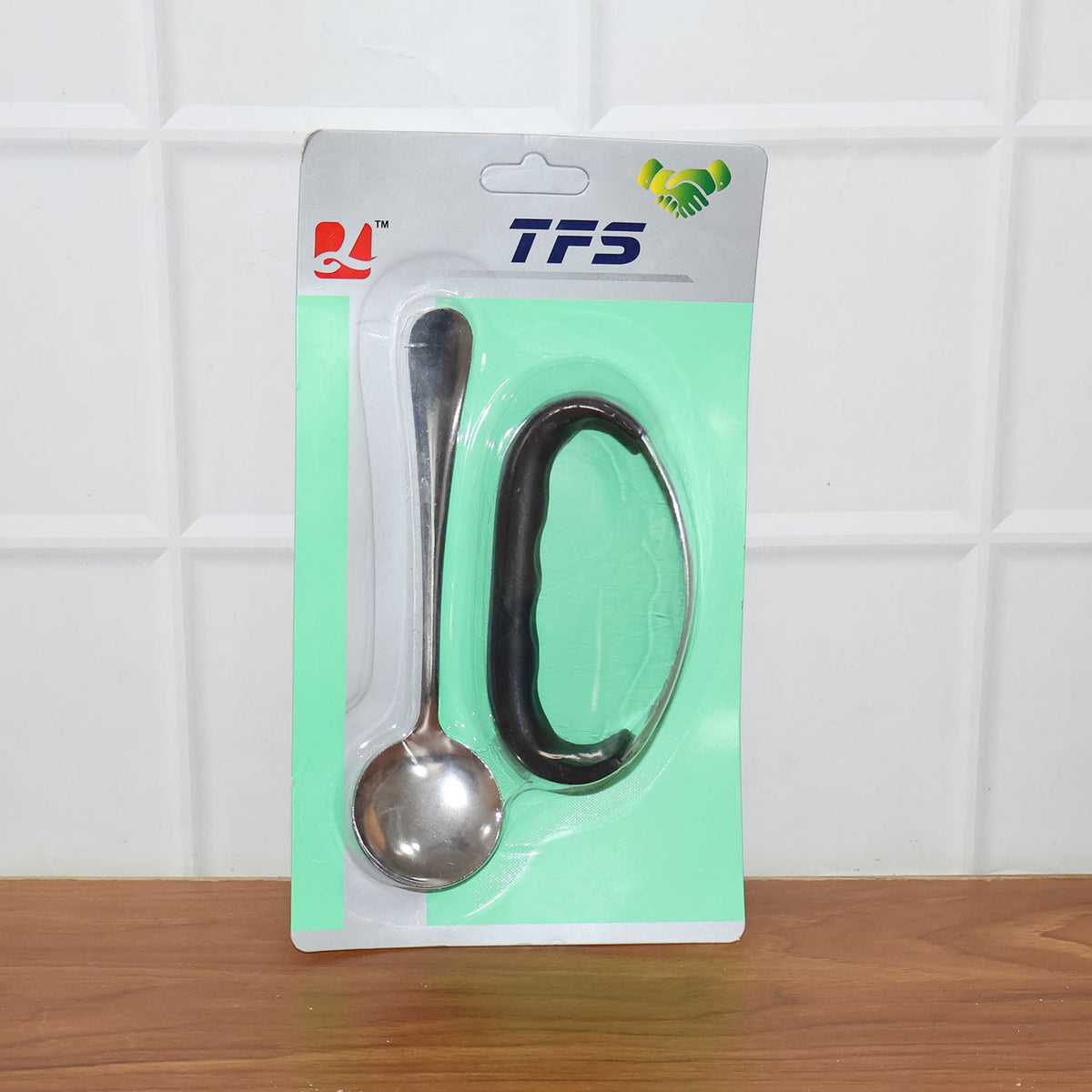 Heavy-duty garlic press tool in use during food preparation