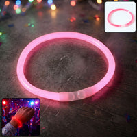 Vibrant Glow LED Bracelet illuminating a dark party environment.