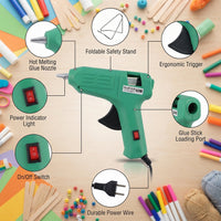 The green 60 Watt hot melt glue gun viewed from the front, highlighting its precise nozzle and glue stick entry.