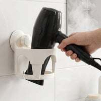 Compact suction cup hair dryer holder for bathroom