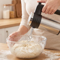 Electric hand beater for whipping cream, eggs and cake batter