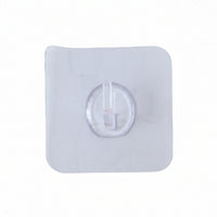 Plastic adhesive wall hook on wardrobe surface