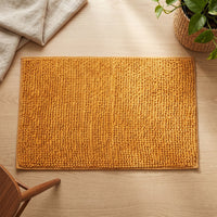 Soft absorbent mat for bathrooms, kitchens and halls
