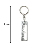 Close-up of Jay Sonal Ma devotional keychain in metallic finish