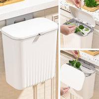 Kitchen dustbin showing its wall and cabinet hanging mechanism