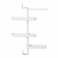 Rotating storage rack filled with kitchen items demonstrating storage capacity