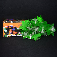 Festive multi-color Leaf & Flower LED Decorative String Light illuminating a home wall