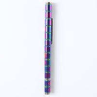 The magnetic pen creatively arranged into various abstract shapes on a desk.