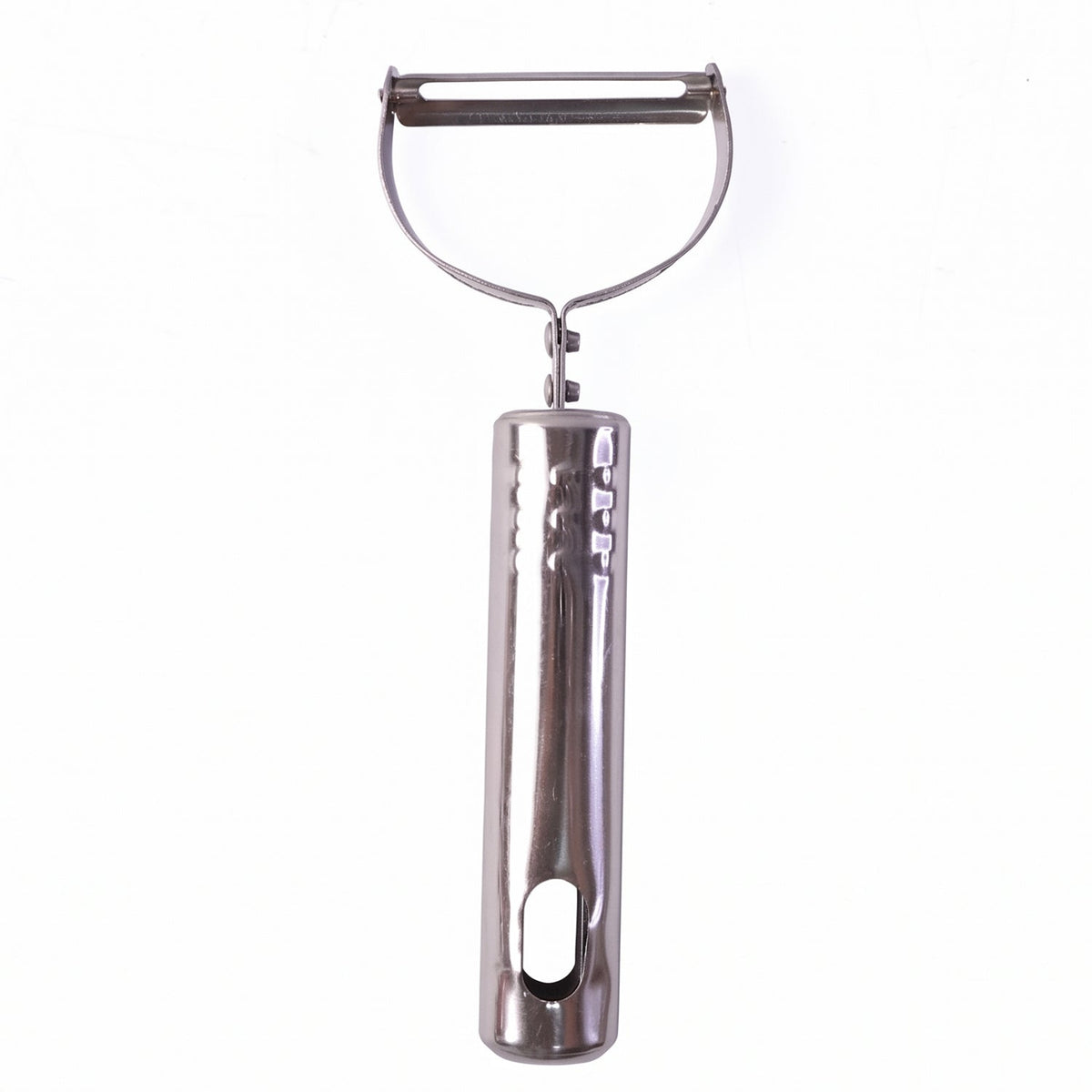 Stainless steel peeler on kitchen counter with peeled vegetables