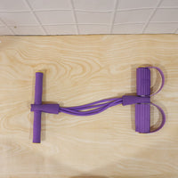 User demonstrating pull rope resistance exerciser during workout