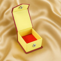 Open ring gift box showing soft velvet cushion and snap closure