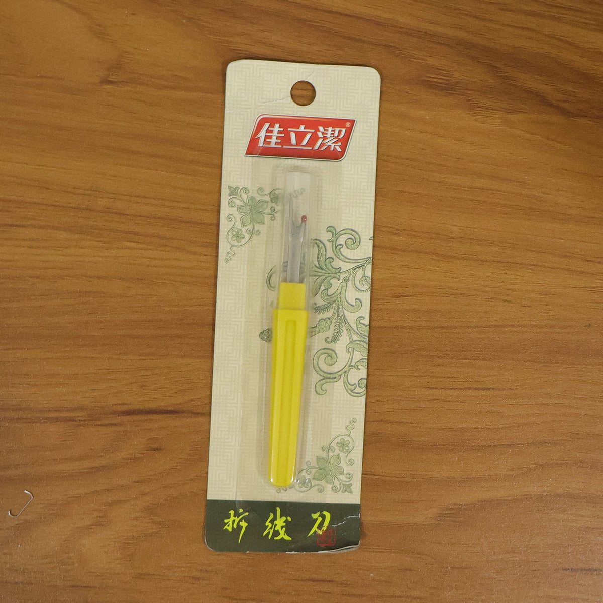 Sewing accessory, a precision thread remover seam ripper for various crafts.