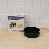 Everyday use of the rotating storage tray for kitchen essentials.