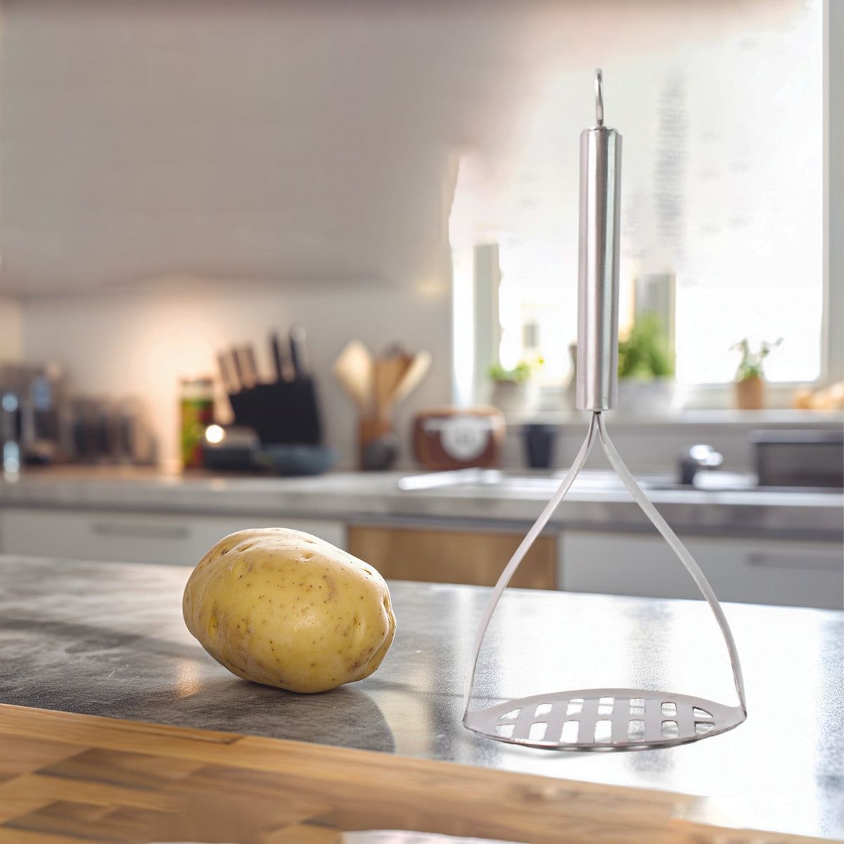 Detail image of stainless steel potato masher blade and handle