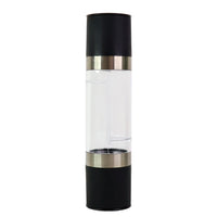 Clear acrylic chamber displaying salt and peppercorns inside grinder