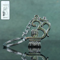 Om Shivling metal keychain showing front view and spiritual design