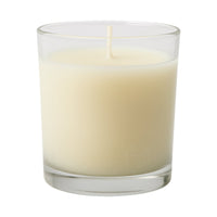 Scented votive candle adding a festive touch to Diwali decorations.