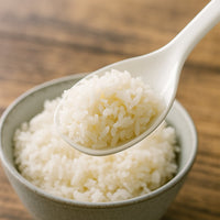 Side view of non-stick rice serving spoon for sticky dishes
