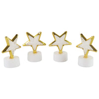 Star Shaped Flameless LED Candles illuminating a festive table setting.
