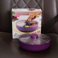 Purple rotating dry fruit container product in clear table setting