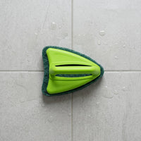 Ergonomic plastic handle of the bathroom cleaning brush for comfortable, dry grip.