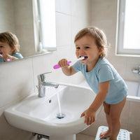 Panda character toothbrush with bright red motorcycle toy