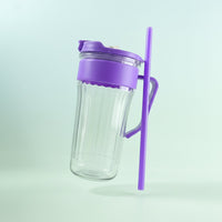 Side view of kids plastic tumbler featuring straw and handle