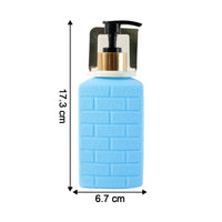 Close-up showing easy-press pump on wall-mounted soap dispenser