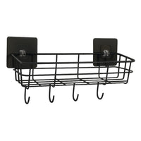 Close-up of basket hooks holding towels and loofahs efficiently
